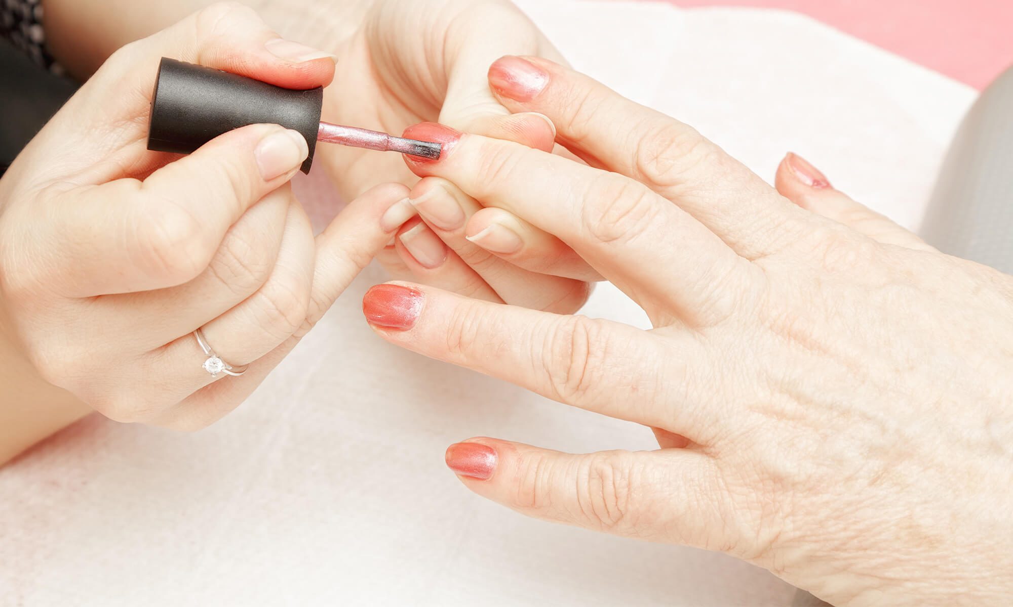 Retiree getting manicure